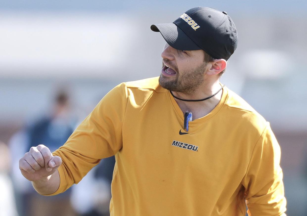 Casey Woods, Missouri tight ends coach and recruiting coordinator, communicates with players during practice last year.