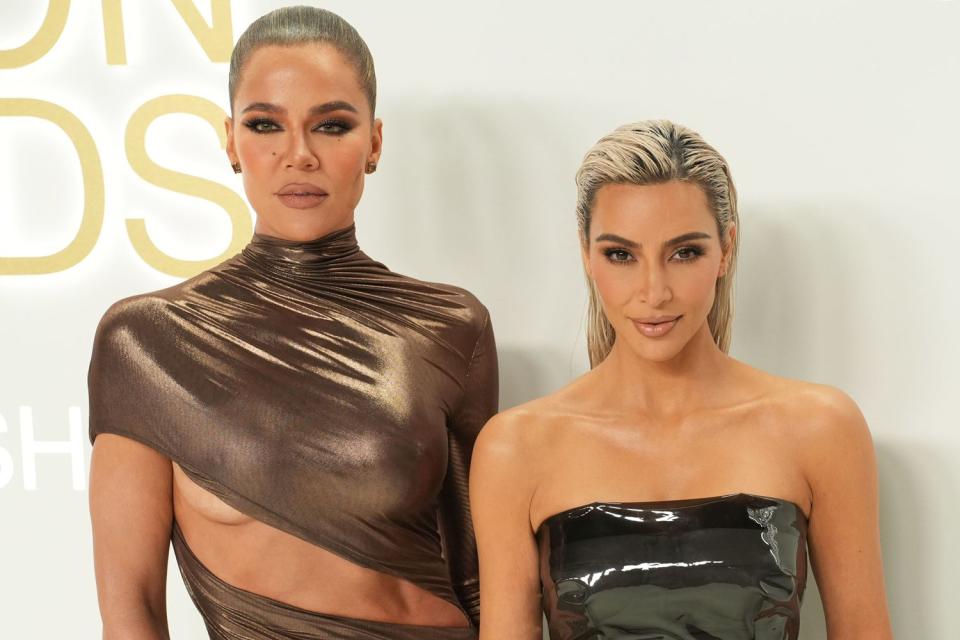 <p>Sean Zanni/Patrick McMullan via Getty</p> Khloe and Kim Kardashian in November 2022