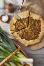 <p>This savory pie is the perfect brunch or make-ahead lunch, served hot or cold! Sautéed leeks turn tender and mild, and are then mixed with rich cream, sharp Gruyère cheese, and a touch of dry wine, then baked into a freeform crust.</p><p><strong><a href="https://www.countryliving.com/food-drinks/a42434629/buttered-leek-gruyere-galette-recipe/" rel="nofollow noopener" target="_blank" data-ylk="slk:Get the recipe for Buttered Leek and Gruyère Galette;elm:context_link;itc:0;sec:content-canvas" class="link ">Get the recipe for Buttered Leek and Gruyère Galette</a>.</strong></p>