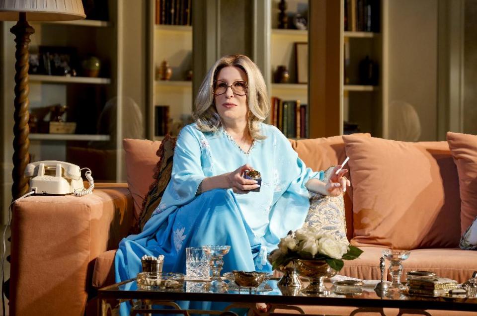 This theater image released by Boneau/Bryan-Brown shows Better Midler as Hollywood agent Sue Mengers in "I'll Eat You Last: A Chat with Sue Mengers," at the Booth Theatre in New York. (AP Photo/ Boneau/Bryan-Brown, Richard Termine)