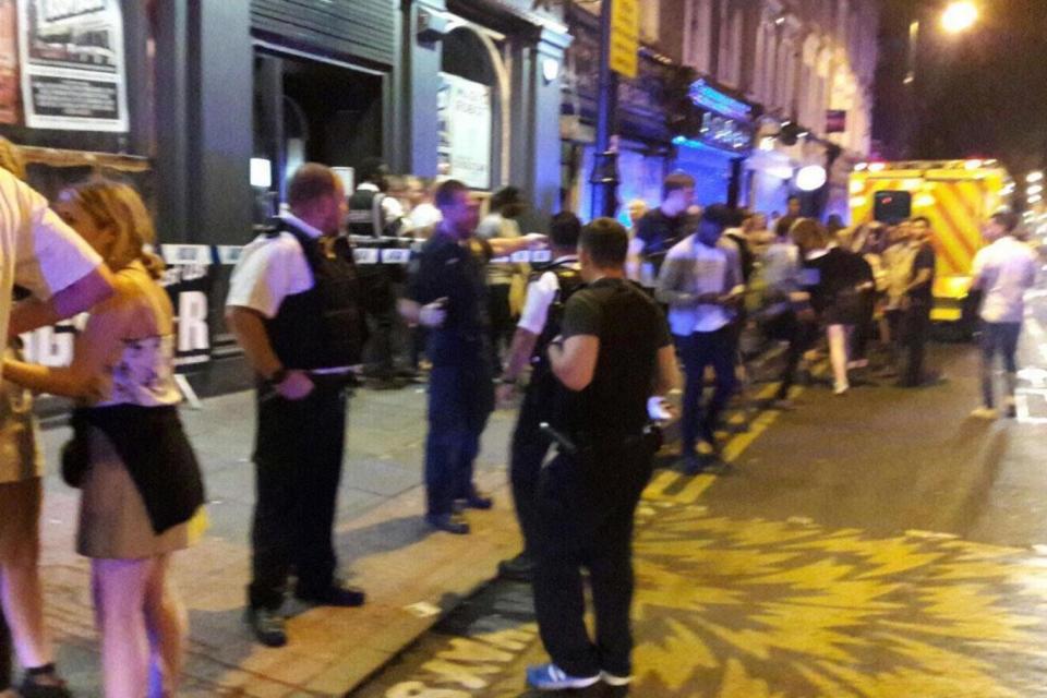 Police cordon: Officers ordered the club to evacuate.