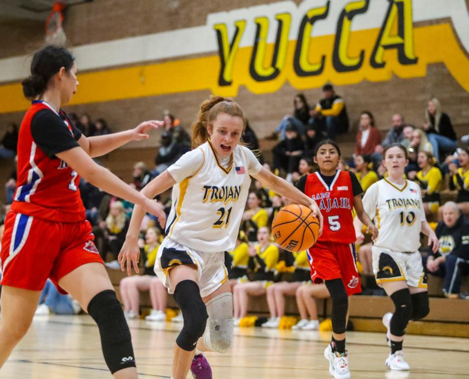 Yucca Valley's Malia Ulery (21) advances toward the hoop during the third quarter of their game in Yucca Valley, Calif., Tuesday, Dec. 6, 2022. 