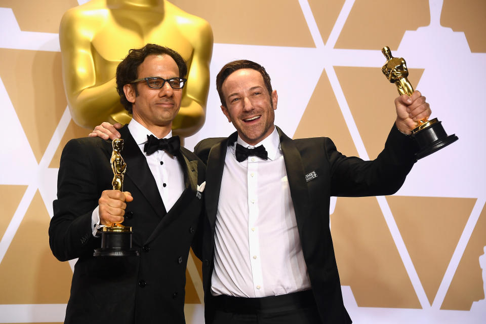 HOLLYWOOD, CA - MARCH 04:  Producer Dan Cogan (L) and director Bryan Fogel, winners of the Best Documentary Feature award for 'Icarus,' pose in the press room during the 90th Annual Academy Awards at Hollywood & Highland Center on March 4, 2018 in Hollywood, California.  (Photo by Frazer Harrison/Getty Images)