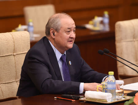 Uzbek Foreign Minister Abdulaziz Kamilov speaks during his meeting with Chinese State Councilor and Foreign Minister Wang Yi (not pictured) at the Diaoyutai State Guest House in Beijing, China, April 24, 2018. Madoka Ikegami/Pool via REUTERS