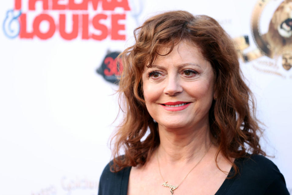 Susan Sarandon at an event wearing a necklace that says honey on it