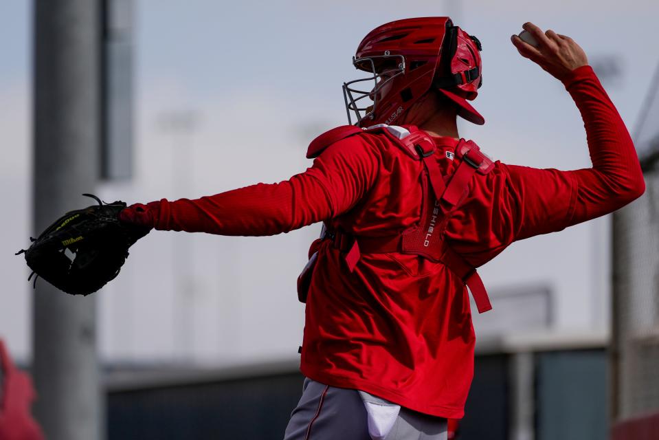 Cincinnati Reds catcher Tyler Stephenson catches a bullpen session during spring training on Feb. 22.