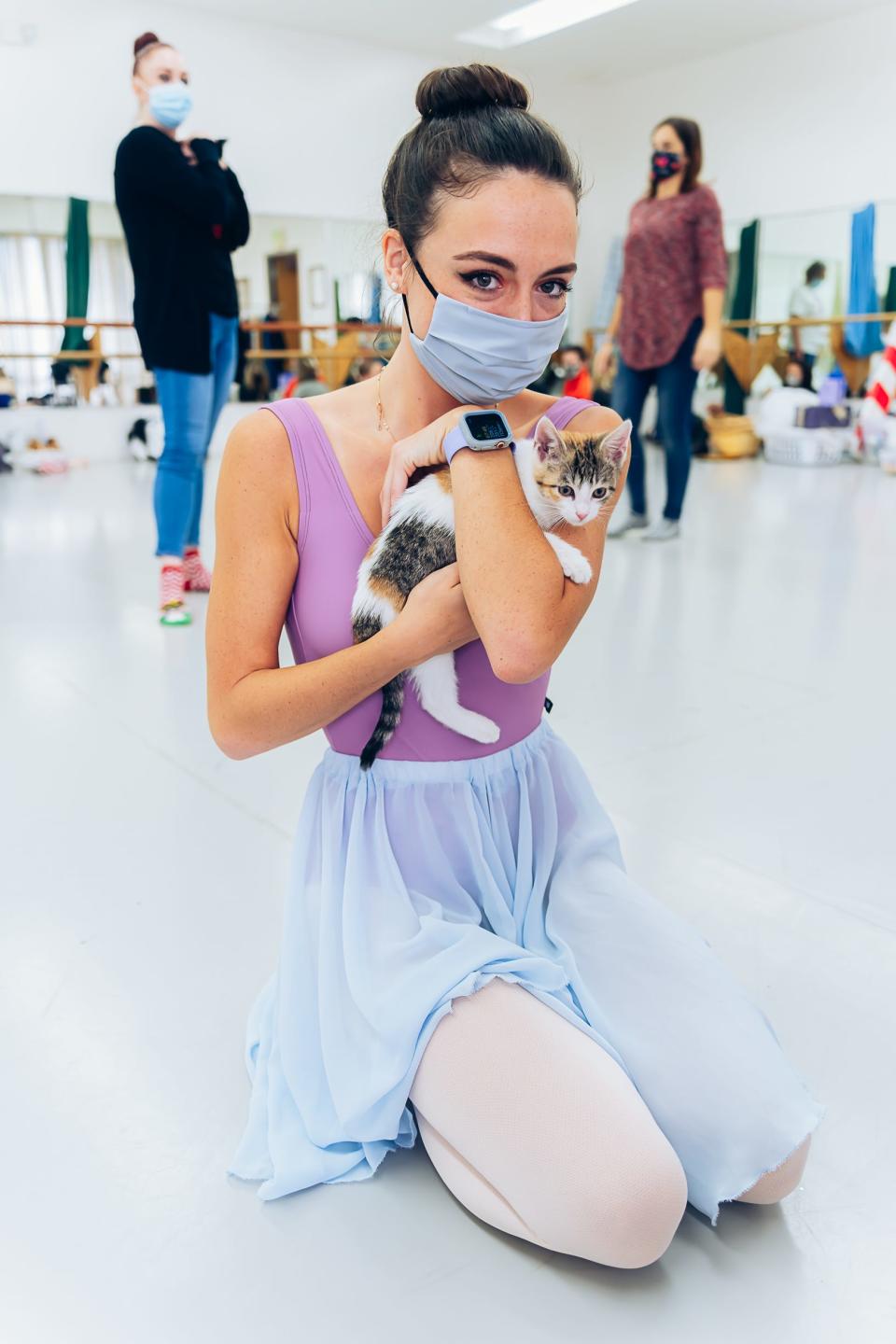 Ahead of their "Nutcracker" production, Canyon Concert Ballet dancers played and posed with adoptable cats and dogs from Fort Collins' Animal Friends Alliance for their annual holiday "Muttcracker" photo shoot.