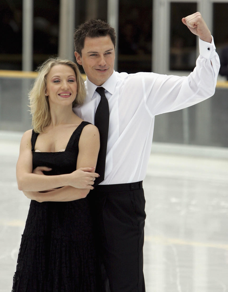 LONDON - JANUARY 11: John Barrowman and Olga Sharutenko attend the launch of the new ice skating reality TV show Dancing On Ice at the Natural History Museum on January 11, 2006 in London, England. Torvill and Dean, reunited for first time in eight years, will coach the contestants which pits 10 celebrities (paired with professional dancers) against one another. Each week couples face public and panel votes, with the lowest scoring pair being evicted.  (Photo by Chris Jackson/Getty Images)