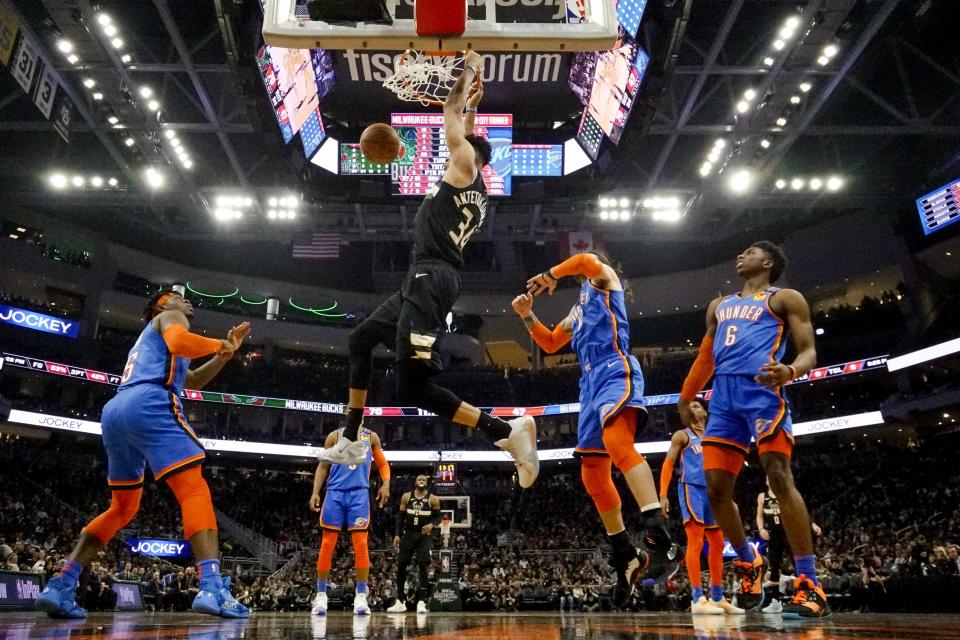 Milwaukee Bucks' Giannis Antetokounmpo dunks during the second half of an NBA basketball game against the Oklahoma City Thunder Friday, Feb. 28, 2020, in Milwaukee. (AP Photo/Morry Gash)