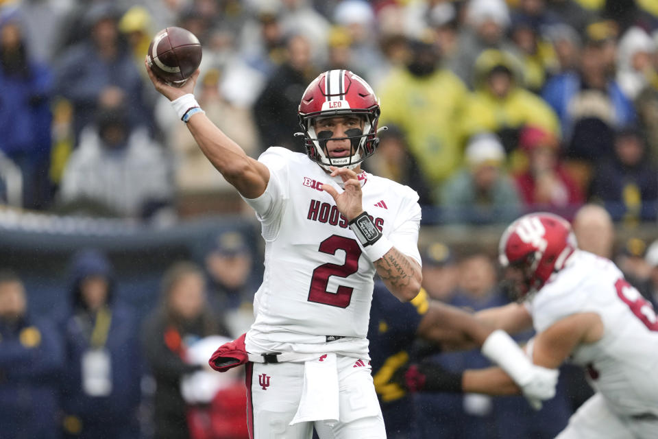 Indiana quarterback Tayven Jackson (2) throws against Michigan in the first half of an NCAA college football game in Ann Arbor, Mich., Saturday, Oct. 14, 2023. (AP Photo/Paul Sancya)