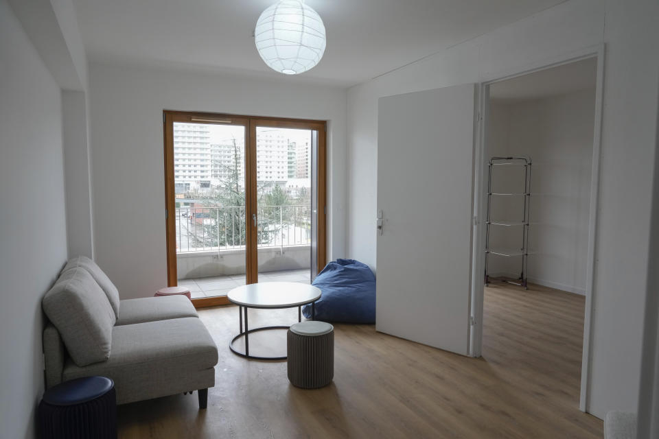 FILE - A living room of the Olympic village is pictured, in Saint-Denis, north of Paris Wednesday, Feb. 28, 2024. The U.S. Olympic team is one of a handful that will supply air conditioners for their athletes at the Paris Games in a move that undercuts organizers' plans to cut carbon emissions. (AP Photo/Thibault Camus, File)