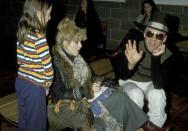 <p>Steve Martin and his wife Bernadette Peters wait in the Aspen Airport lounge for a taxi on December 21, 1977. </p>