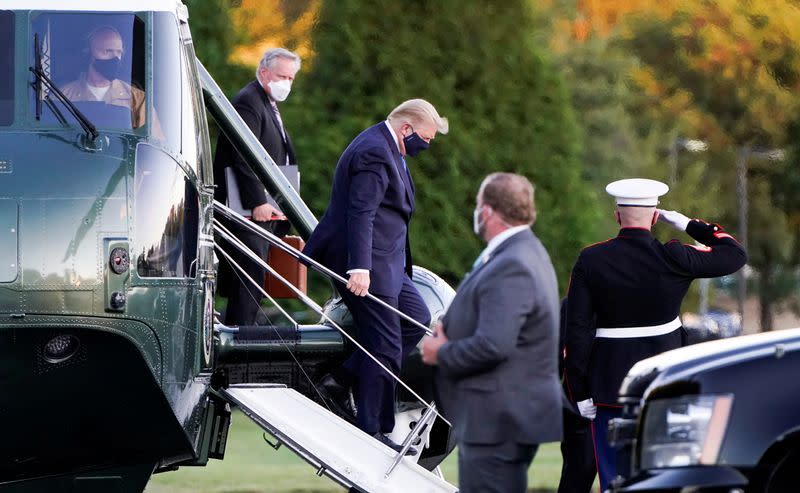 FILE PHOTO: U.S. President Trump arrives to spend at least several days at Walter Reed National Military Medical Center in Bethesda, Maryland