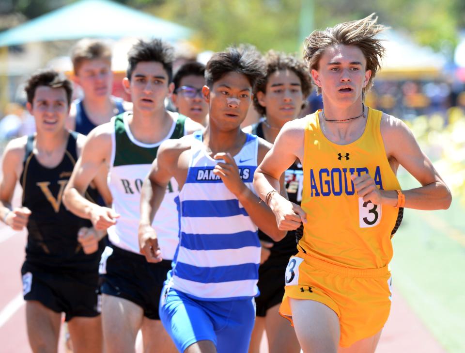 Ethan Godsey of Agoura High leads the Division 2 boys 1,600-meter race during the CIF-Southern Section Track and Field Championships at Moorpark High on Saturday, May 14, 2022. Godsey finished second.