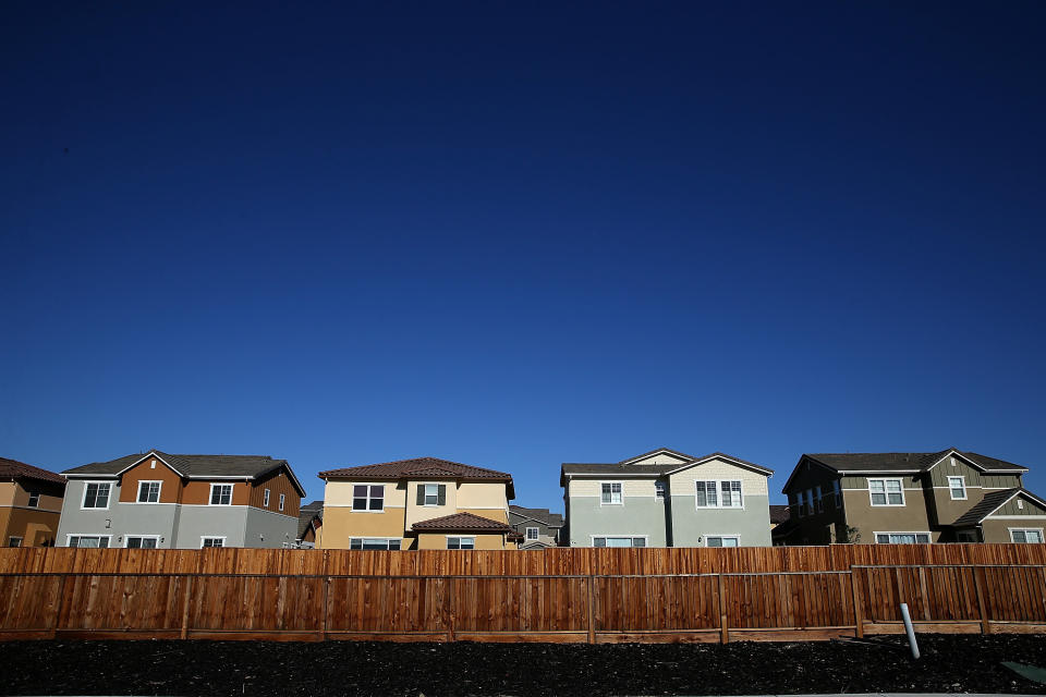 A row of new single-family homes at a housing development in Dublin, California. Encouraging all-electric homes would contribute to the progress. (Photo: Justin Sullivan via Getty Images)