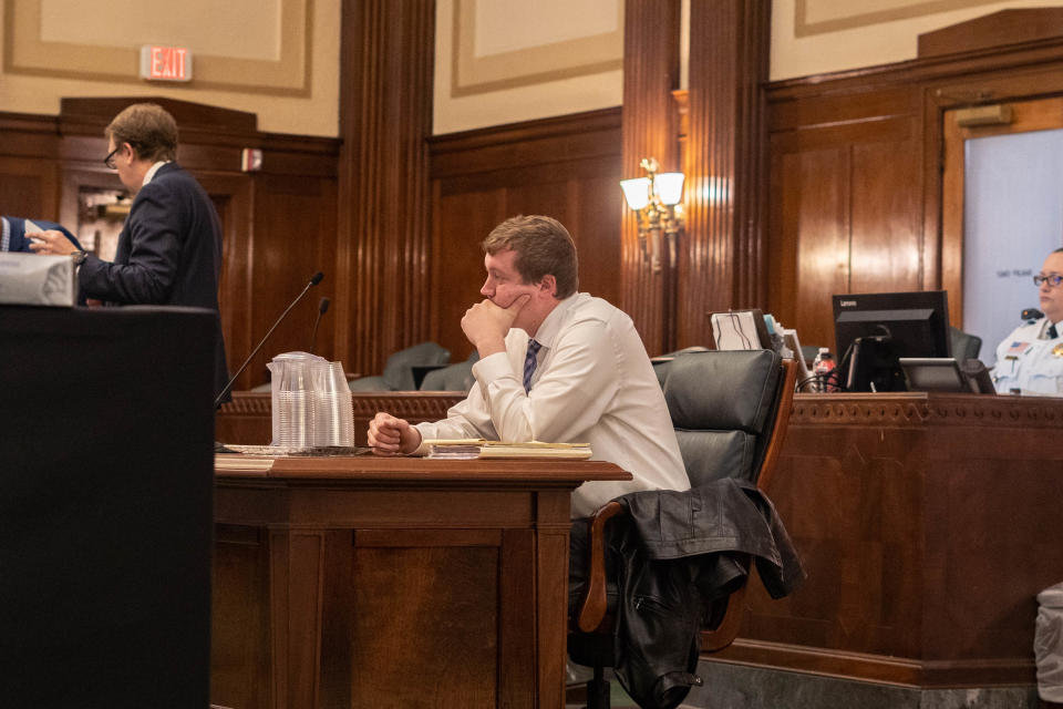 Former Buncombe County Sheriff's deputy Tyler McDonald sits in the Buncombe County Courthouse before his trial on May 10, 2022.