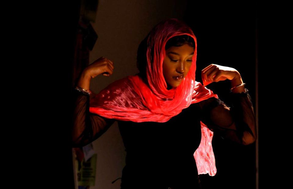 At a rehearsal, Michelle Washington prepares for a scene of “The Glorious World of Crowns, Kinks and Curls.”