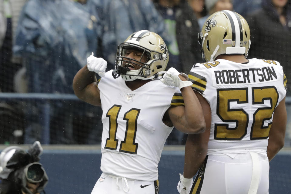 New Orleans Saints' Deonte Harris (11) celebrates his touchdown on a punt return against the Seattle Seahawks during the first half of an NFL football game Sunday, Sept. 22, 2019, in Seattle. (AP Photo/Ted S. Warren)