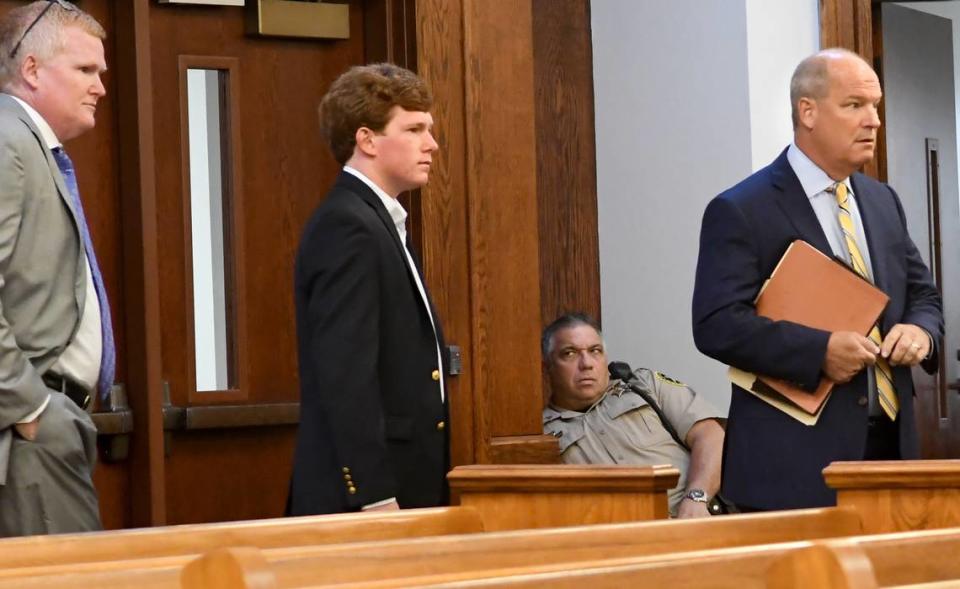 Paul Terry Murdaugh, center, enters the courtroom in 2019, led by his defense attorney Jim Griffin and followed by Paul’s father, Richard Alexander Murdaugh. Griffin sought to have Paul Murdaugh’s bond modified before judge Michael G. Nettles. Nettles ruled that Murdaugh may travel within the state with no other modifications. The state had asked for GPS monitoring as well as alcohol monitoring which was not a condition set by Nettles.