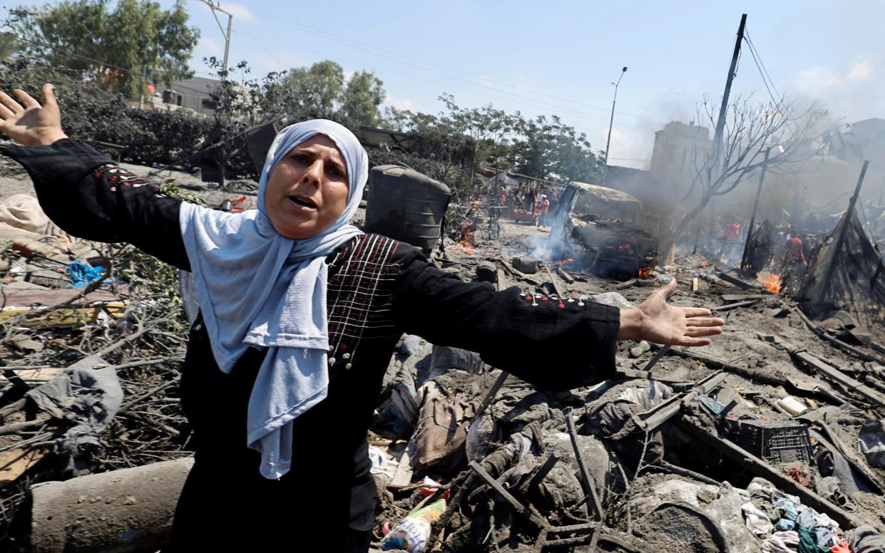 A Palestinian woman near the attack site