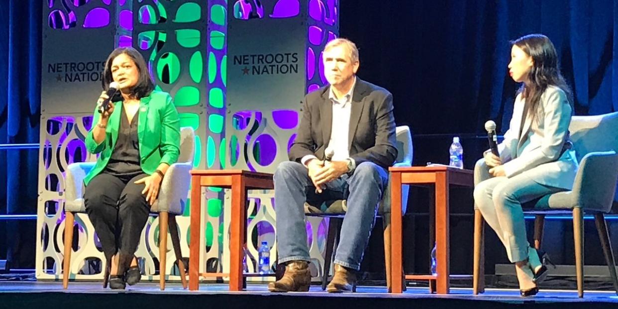 Rep. Pramila Jayapal (left) and Sen. Jeff Merkley speak at the Netroots Nation conference.