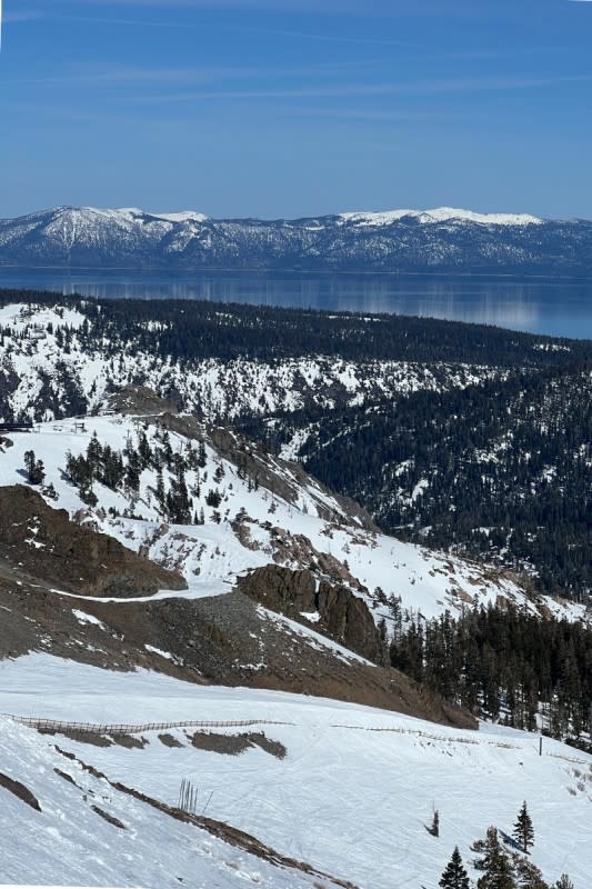 Looking towards Lake Tahoe from Headwall summit. Some of Palisades' south-facing aspects, like the entry to 'The Slot', are melted out. (4/9/24)<p>Photo: Matt Lorelli/Powder Magazine</p>