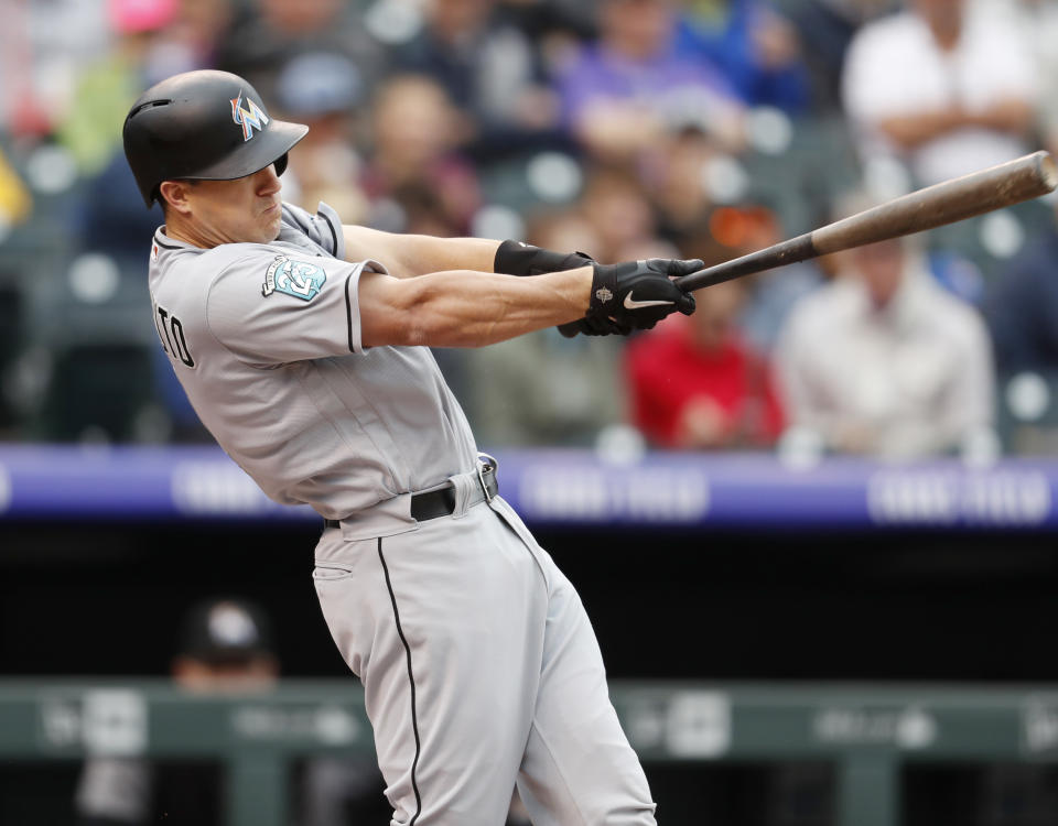 Miami Marlins’ J.T. Realmuto highlights this week’s look at fantasy risers and fallers. (AP Photo).