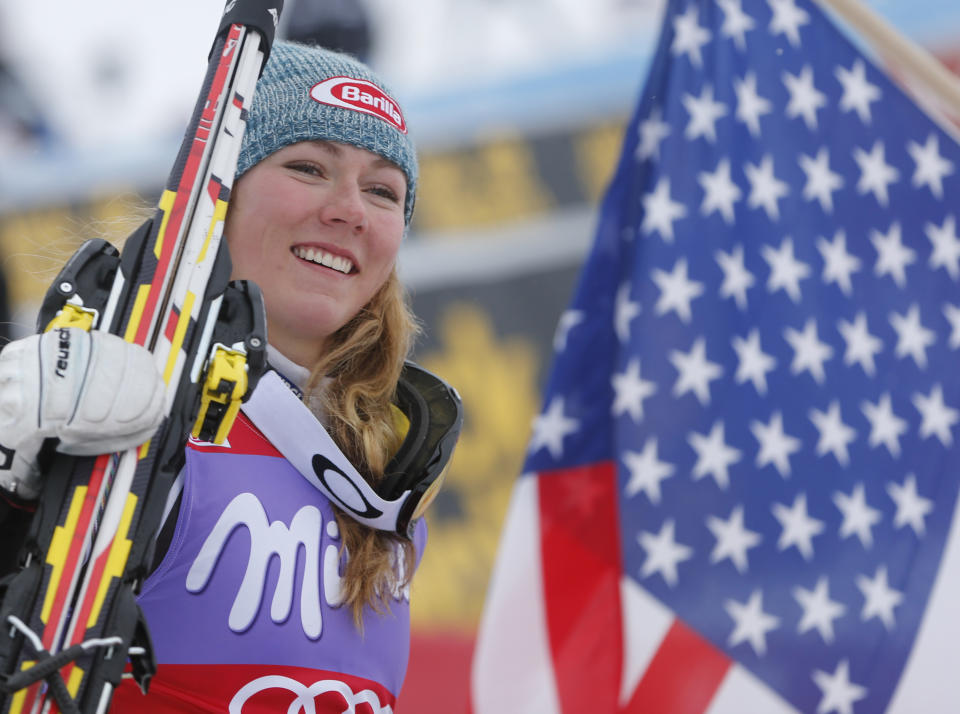 Mikaela Shiffrin, of the United States, celebrates after winning an alpine ski, women's World Cup slalom, in Bormio, Italy, Sunday, Jan. 5, 2013. (AP Photo/Marco Trovati)