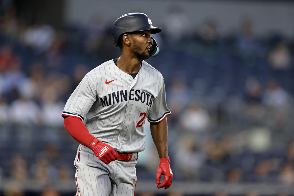 Minnesota Twins' Michael A. Taylor watches his two-run home run against the New York Yankees during the first inning of a baseball game Thursday, April 13, 2023, in New York. (AP Photo/Adam Hunger)