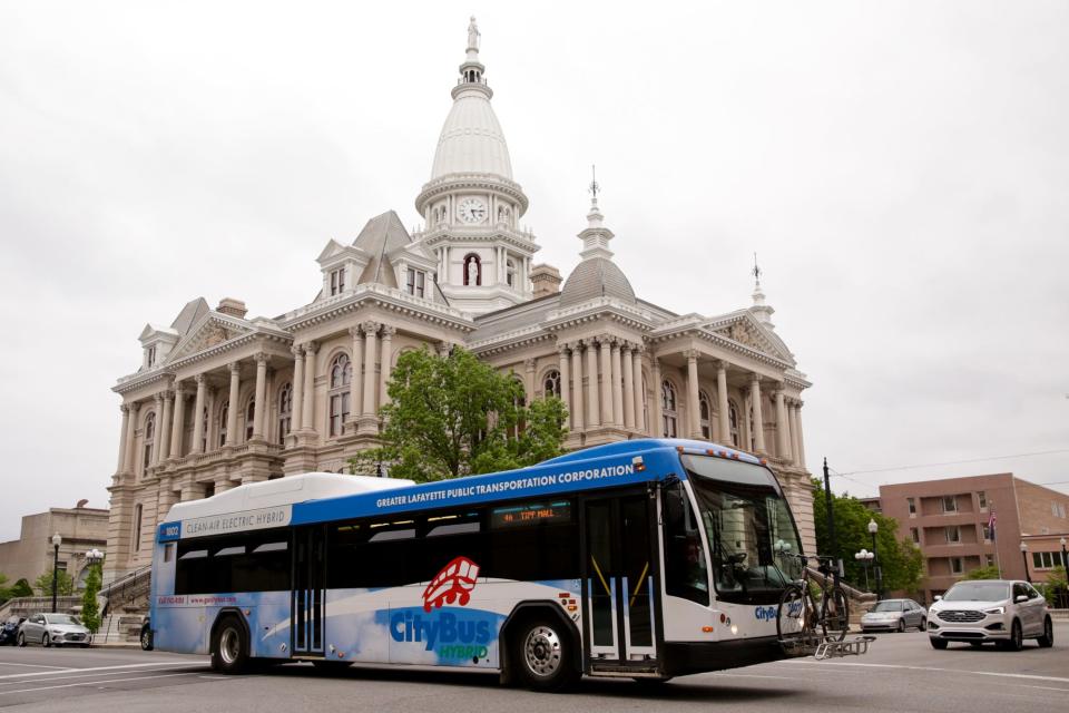 A CityBus drives past the Tippecanoe County Courthouse on Third Street, Thursday, May 21, 2020 in Lafayette.