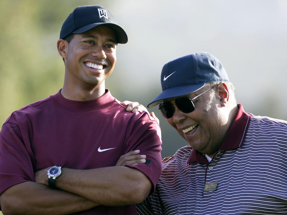 Tiger Woods with his father Earl Woods at the trophy presentation of The Target