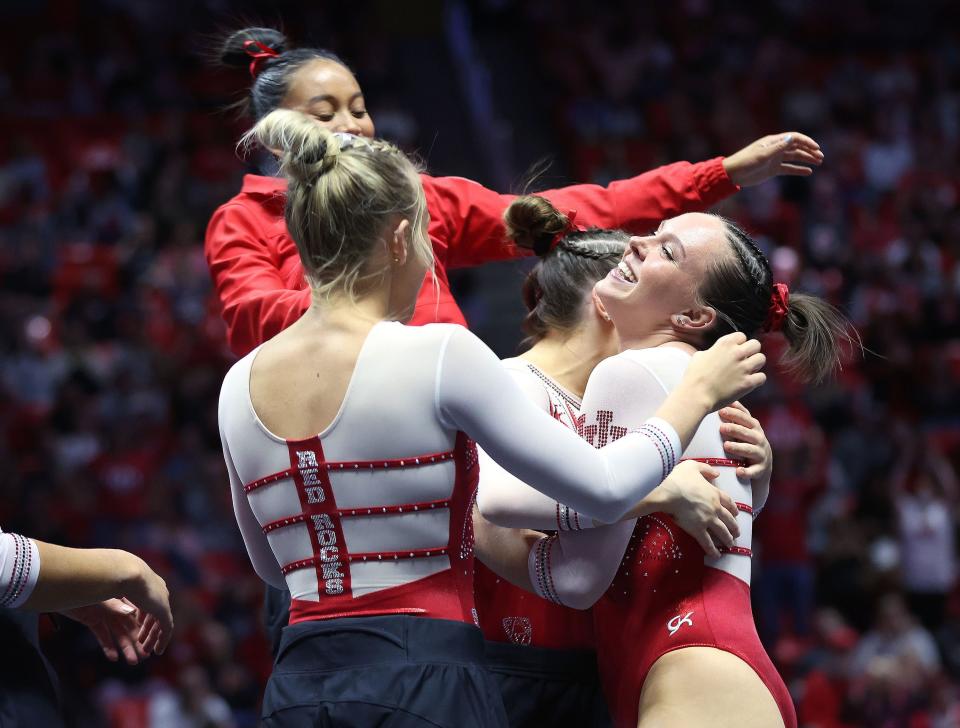 Utah Red Rocks gymnast Maile O’Keefe celebrates on the floor with teammates in their match against ASU in Salt Lake City on Friday, Jan. 26, 2024. | Jeffrey D. Allred, Deseret News