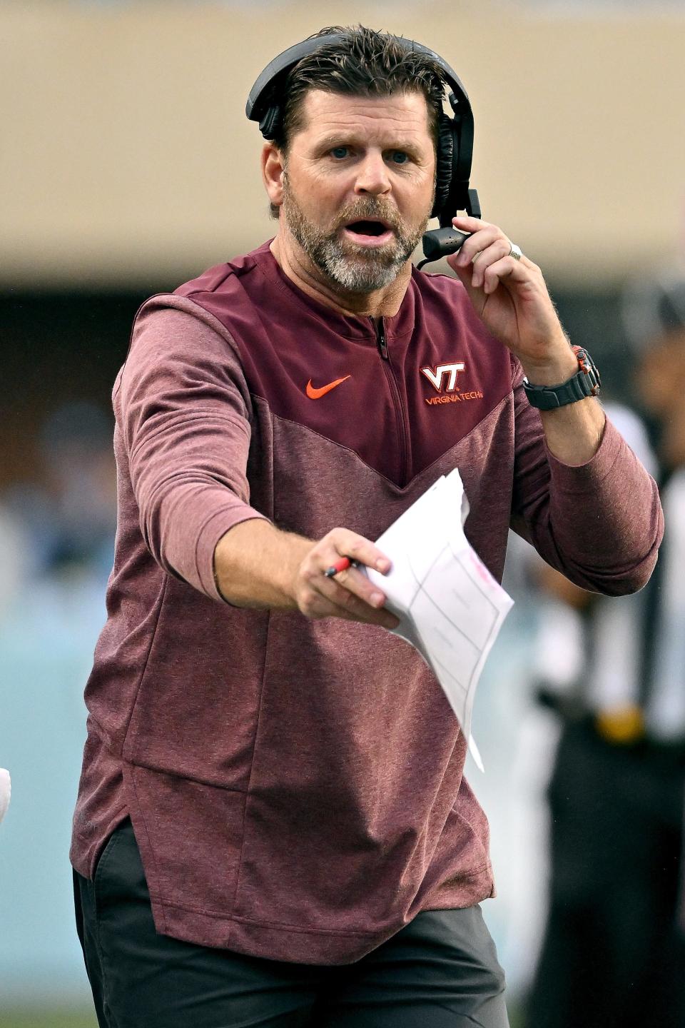 CHAPEL HILL, NORTH CAROLINA - OCTOBER 01: Head coach Brent Pry of the Virginia Tech Hokies  directs his team against the North Carolina Tar Heels during the second half of their game at Kenan Memorial Stadium on October 01, 2022 in Chapel Hill, North Carolina. (Photo by Grant Halverson/Getty Images)