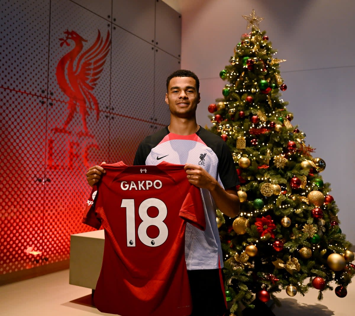 Cody Gakpo poses with the Liverpool shirt (Getty Images)
