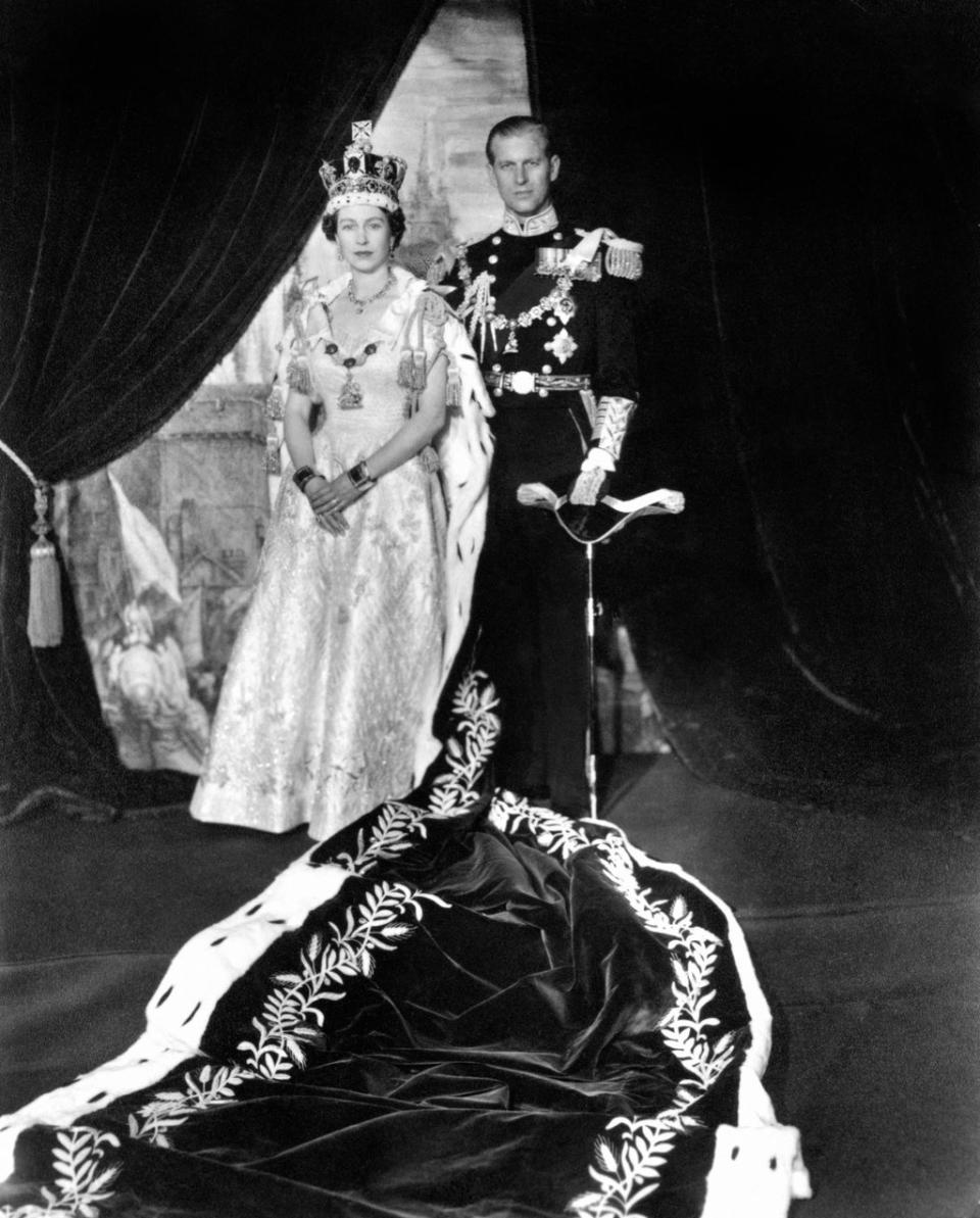 The Queen with the Duke of Edinburgh at Buckingham Palace after her Coronation (PA) (PA Archive)