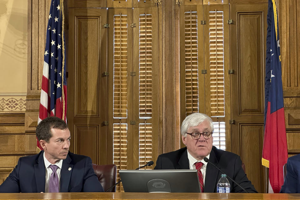 Georgia state Sen. Bill Cowsert, R-Athens, right, speaks as state Sen Greg Dolezal, R-Cumming, looks on, Friday, Feb. 9, 2024, at the Georgia Capitol in Atlanta, during the first meeting of a state Senate committee to investigate Fulton County District Attorney Fani Willis. Cowsert says an inquiry into whether Willis committed misconduct won't be a partisan "witch hunt," but minority Democrats say they doubt the inquiry's good faith. (AP Photo/Jeff Amy)