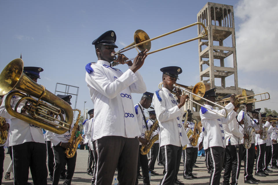 A band plays music at a demonstration supporting a resolution to allocate 13 seats to the Banadir region which encompasses the capital, in effect expanding the Senate, in Mogadishu, Somalia Friday, Jan. 29, 2021. As Somalia marks three decades since a dictator fell and chaos engulfed the country, the government is set to hold a troubled national election but two regional states are refusing to take part in the vote to elect Somalia's president and time is running out before the Feb. 8 date on which mandates expire. (AP Photo/Farah Abdi Warsameh)