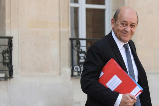 France's top diplomat Jean-Yves Le Drian called Washington's reimposition of sanctions on Iran "unacceptable"