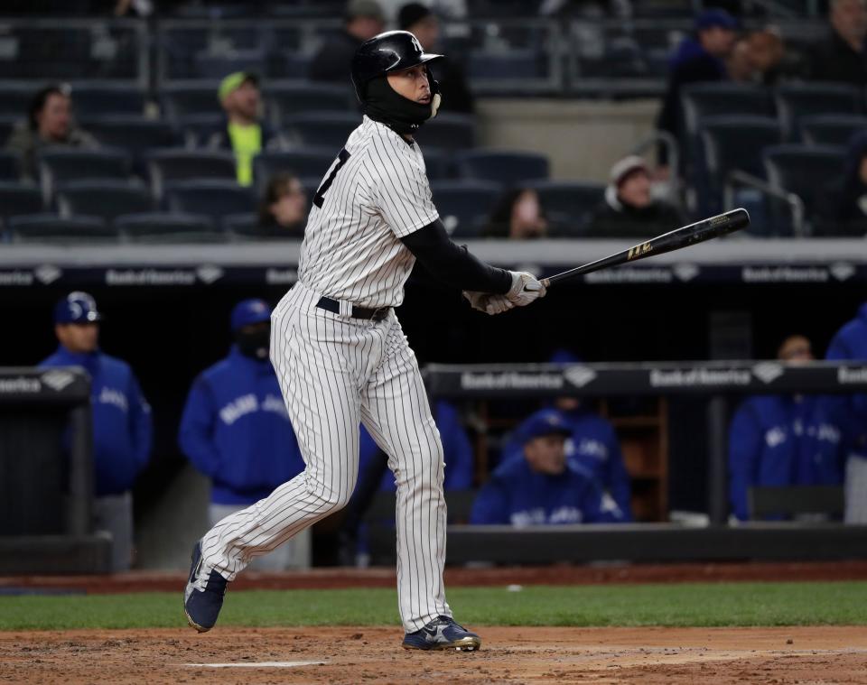 New York Yankees’ Giancarlo Stanton connects for a two-run home run against the Toronto Blue Jays during the third inning on Friday, April 20, 2018, in New York. (AP Photo)