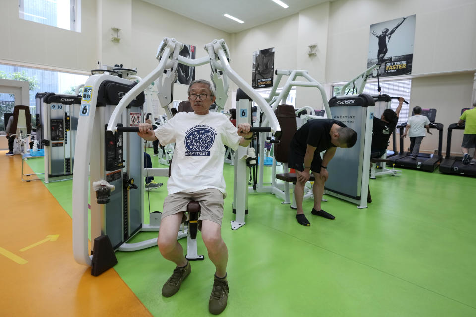 Toshiyuki Honma, 70, uses a chest press machine as he works out at the Fukagawa Sports Center in Tokyo, Wednesday, June 12, 2024. If you are getting up there in years, weight-resistance training might deliver unexpected benefits. (AP Photo/Hiro Komae)