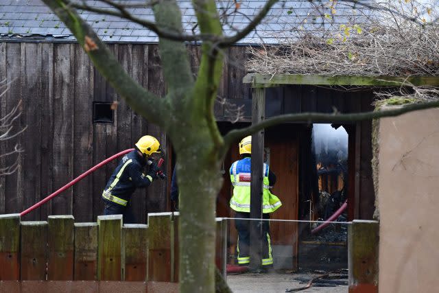 Firefighters at a cafe and shop near the meerkat enclosure at London Zoo 