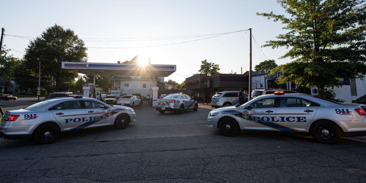 Louisville Metro Police cruisers are seen surrounding a crime scene involving a shooting injury on September 1, 2021 in Louisville, Kentucky. Louisville has experienced a surge in violent crime over the past year and a half, exacerbated by a shrinking police force and, city officials say, officers under increased scrutiny who are more reluctant to carry out duties.