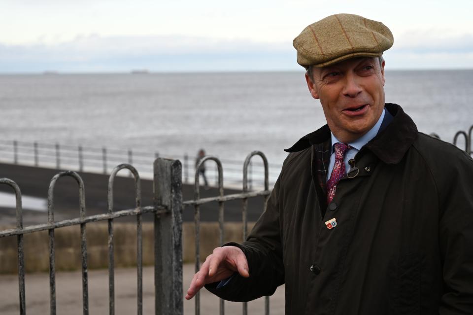 Brexit Party leader Nigel Farage visits the Headland War memorial in Hartlepool, northeast England on November 11, 2019 during a general election campaign visit. - Britain will go to the polls on December 12 to vote in a pre-Christmas general election. (Photo by Paul ELLIS / AFP) (Photo by PAUL ELLIS/AFP via Getty Images)