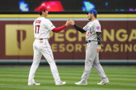 Los Angeles Angels' Shohei Ohtani, left, and Chicago Cubs' Seiya Suzuki shake hands before a baseball game Tuesday, June 6, 2023, in Anaheim, Calif. (AP Photo/Jae C. Hong)