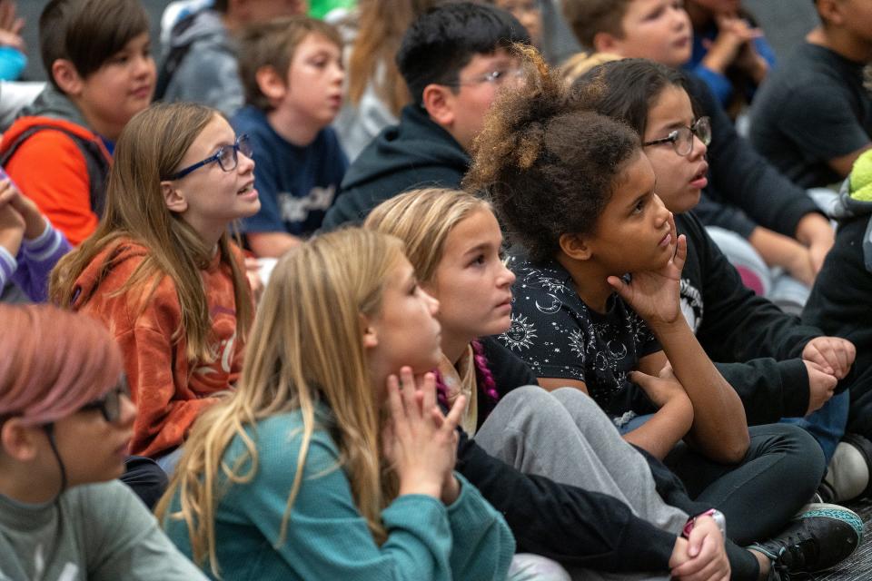 Students listen as volunteers with Joseph Maley Foundation's Westfield Middle School Puppet Troupe put on a puppet show about living with disabilities Monday, Nov. 14, 2022 at Washington Woods Elementary School in Westfield.