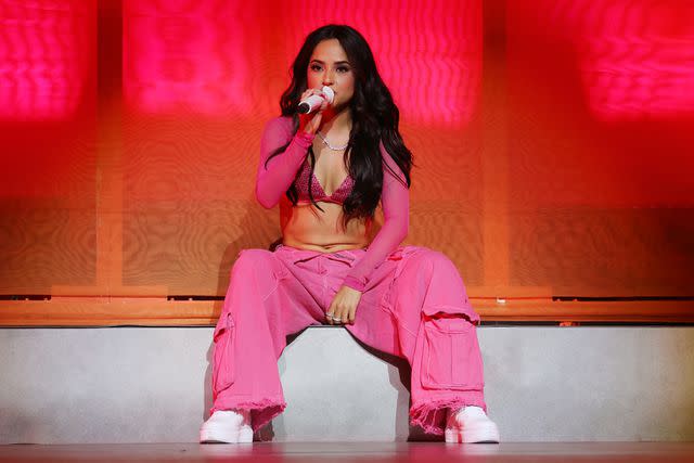 <p>Udo Salters Photography/Getty</p> Becky G performs during the Mi Casa, Tu Casa Tour at the United Palace Theater in New York City