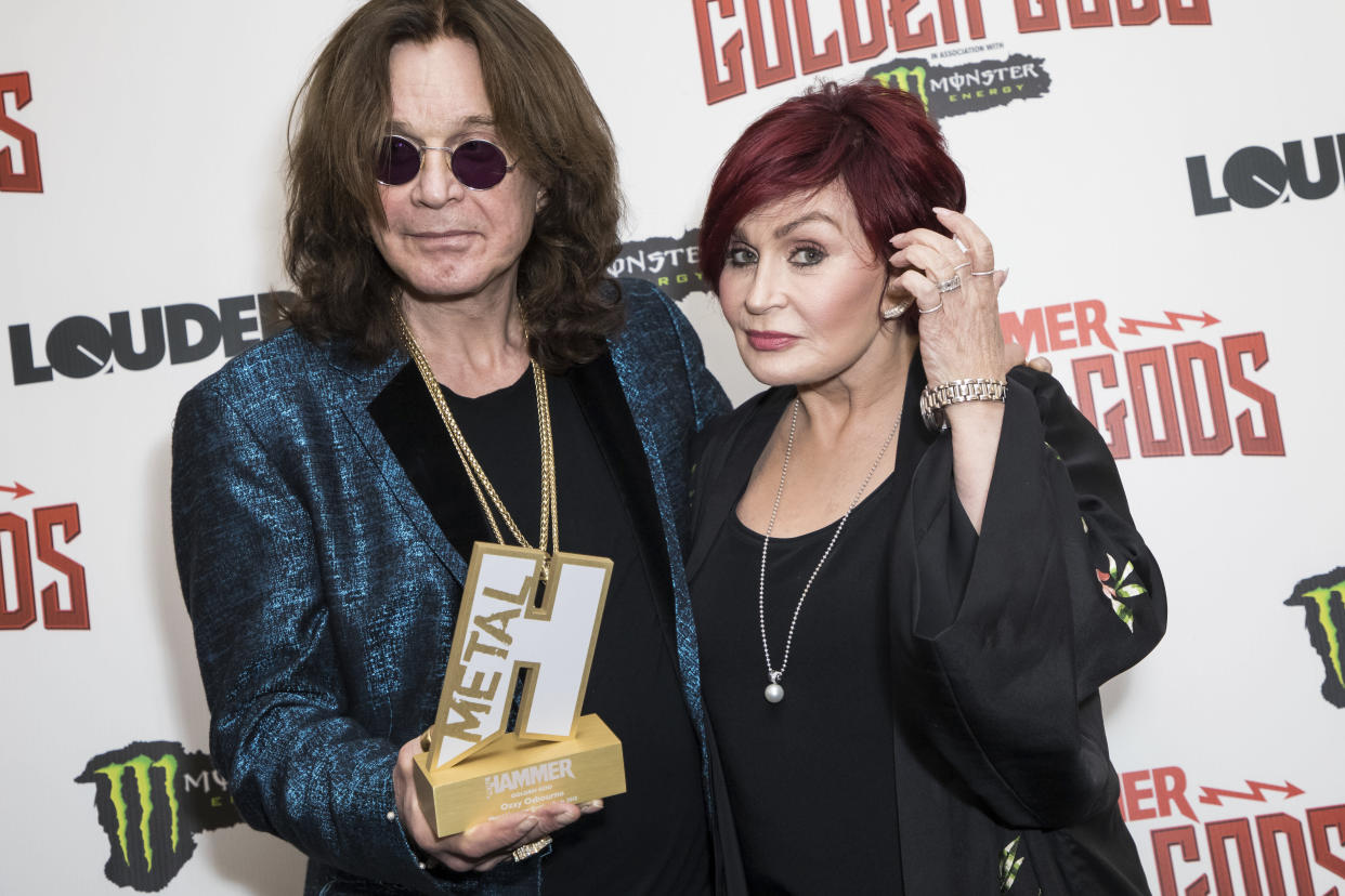 Musician Ozzy Osbourne, left, and his wife Sharon Osbourne pose for photographers after Ozzy received the Golden God award at the Metal Hammer Golden God awards, in London, Monday June 11, 2018. (Photo by Vianney Le Caer/Invision/AP)