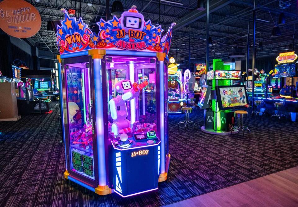 A variety of arcade games are spread throughout the back area of Dave & Buster’s in Folsom on Tuesday, March 26, 2024.
