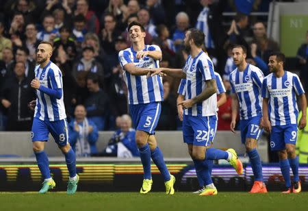 Britain Football Soccer - Brighton & Hove Albion v Norwich City - Sky Bet Championship - The American Express Community Stadium - 29/10/16 Brighton's Lewis Dunk celebrates scoring their third goal with team mates Mandatory Credit: Action Images / Tony O'Brien