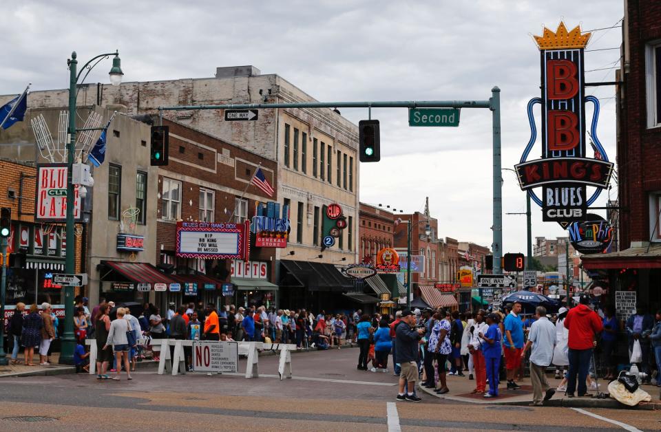 Fans gather on Beale Street for the start of a procession in Memphis, Tennessee.